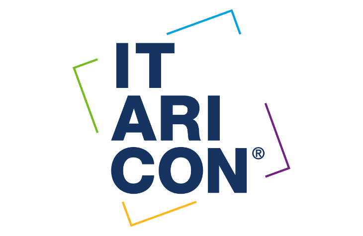 Logo reading 'IT ARICON' with a registered mark, framed by multicolored, angled brackets around the text.